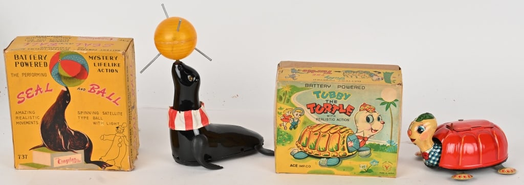 TUBBY THE TURTLE & SEAL AND BALL w/ BOXES: Japan battery operated Tubby the Turtle and Seal and Ball. Both all original in nice condition. Both with Boxes. Largest 8" Excellent