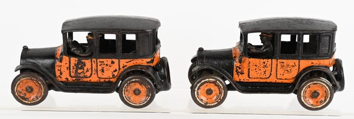 2- ARCADE CAST IRON YELLOW TAXIS