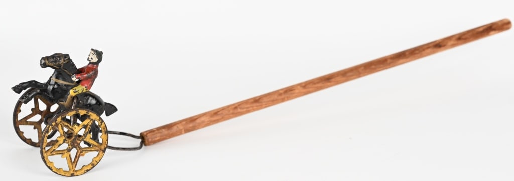 CAST IRON JOCKEY ON HORSE POLE TOY (1 of 6)