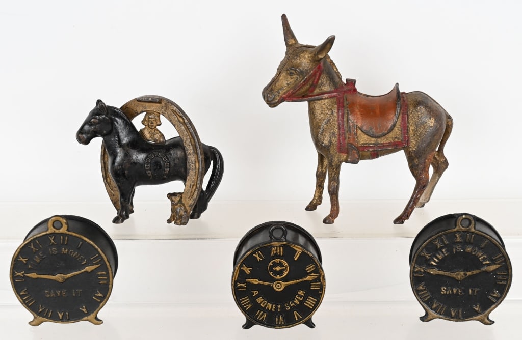 5- CAST IRON STILL BANKS: Includes 3- Tine is Money Banks, Good Luck Horse Shoe Bank, and Donkey Bank. All original in great condition. largest 7" Excellent