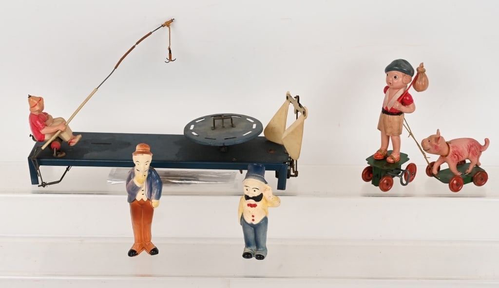 LOT OF CELLULOID TOYS: Includes windup Fisherman, windup Orphan Annie and Sandy, and Mutt and Jeff. All in great shape. Largest 13" Excellent