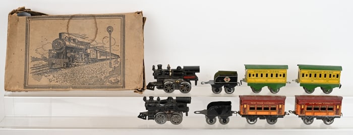 2- EARLY TIN TRAIN SETS w/ CAST IRON LOCOMOTIVES