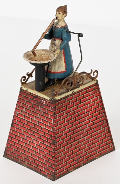 GERMAN TIN CLOCKWORK GIRL BLOWING BUBBLES (1 of 5)