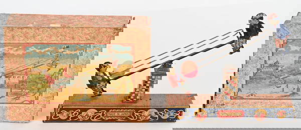 PRE-WAR JAPAN TIN WINDUP SPINNING SEE SAW w/ BOX