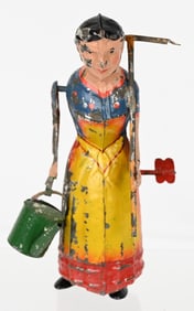 GERMAN HAND PAINTED TIN WINDUP LADY GARDENER