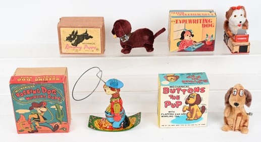 4- JAPAN WINDUP DOG TOYS w/ BOXES