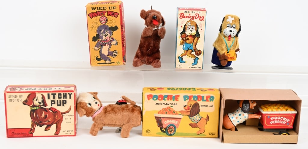 4- JAPAN WINDUP DOG TOYS w/ BOXES: Includes Boxing Dog, Twist Dog, Itchy Pup, and Poochie Peddler. All original in great shape. Windup work. All Boxed. largest 7" Excellent