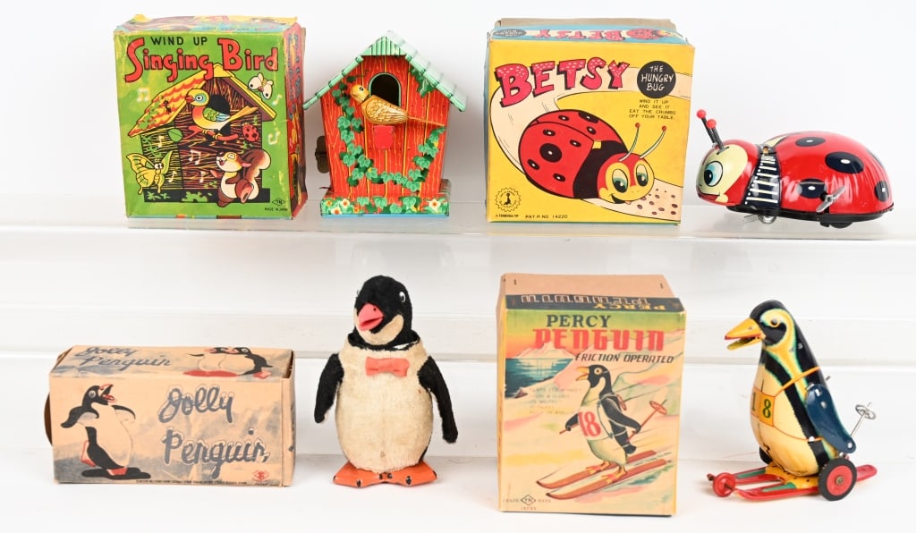 4- JAPAN WINDUP ANIMAL TOYS w/ BOXES: Includes Singing Bird, Jolly Penguin, Percy Penguin, and Betsy Hungry Bug. All original in great shape. Windups work. Boxed. Largest 5 1/2" Excellent