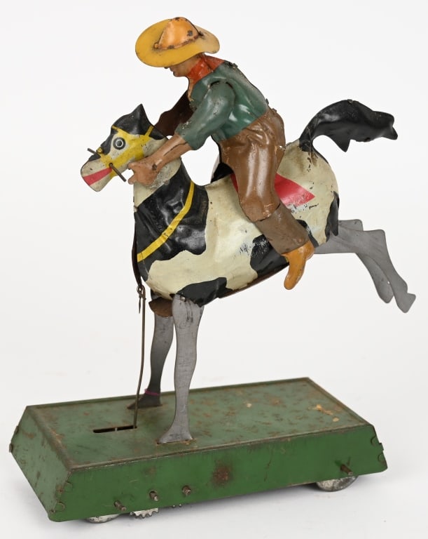 MARX TIN WINDUP BUCKING BRONCO COWBOY (1 of 4)