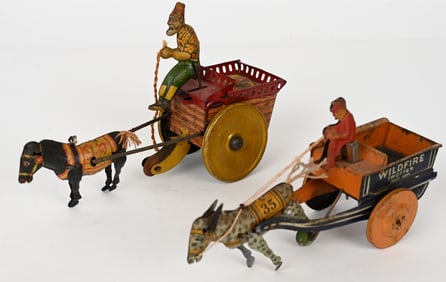 2- STRAUSS TIN WINDUP HORSE DRAWN WAGONS