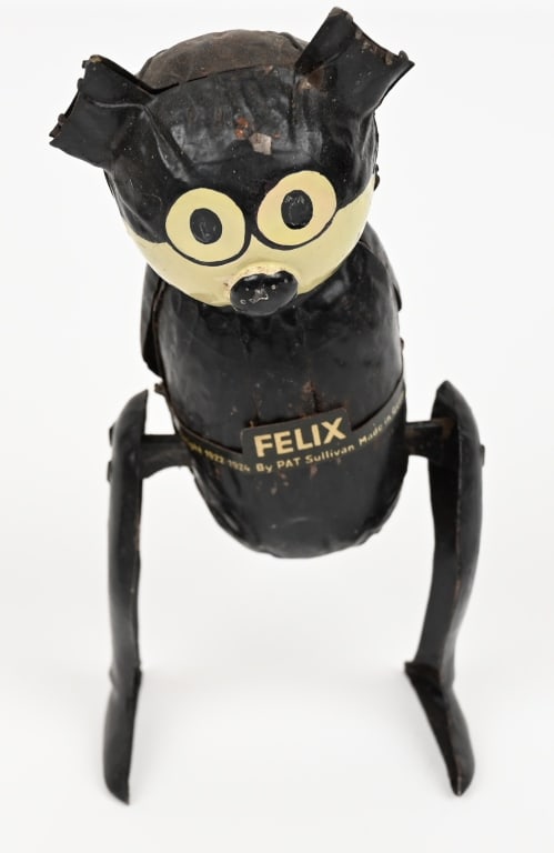 GERMAN NIFTY HAND-PAINTED WIND-UP FELIX THE CAT: Made by Fischer and marketed by Nifty. Made in Germany, marked "Pat Sullivan, Copyright 1922, 1924". Has original tail and worked when tested. has paint touchup. Displays well. 7" Very Good