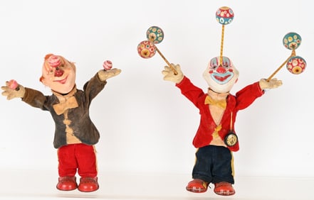 2- JAPAN WINDUP JUGGLING CLOWNS