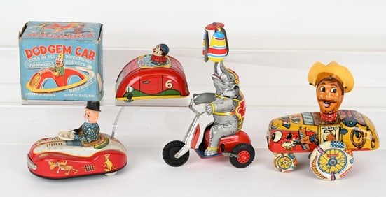 4- TIN WINDUP TOYS, ONE BOXED