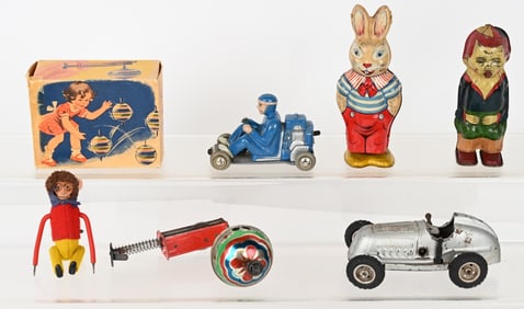 6- TIN WINDUP TOYS