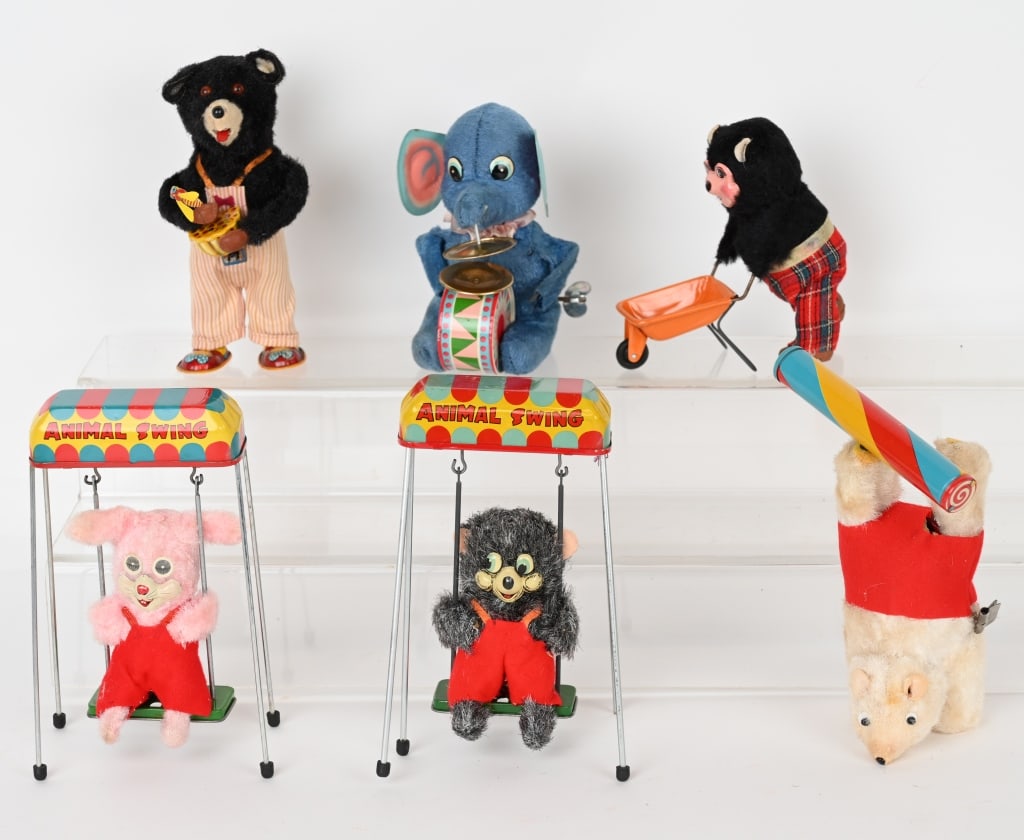 6- JAPAN WINDUP ANIMAL TOYS: Lot includes 6 different tin windup animal toys. All worked when tested. Largest is 6 1/2" Excellent