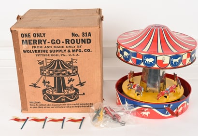 WOLVERINE TIN WINDUP MERRY GO ROUND w/ BOX