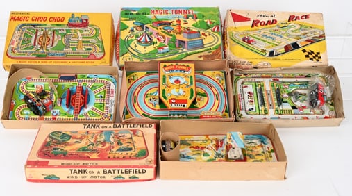 4- JAPAN WINDUP PLATFORM TOYS w/ BOXES