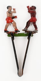 GERMAN TIN SQUEEZE TOY BOXERS
