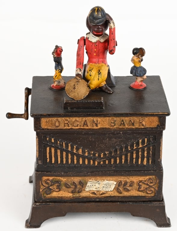 KYSER & REX ORGAN BOY / GIRL MECHANICAL BANK: Organ cast iron bank with boy and girls. Complete and original. Strong paint. Has light hairline in left lattice under original paint . Works properly. Has correct original trap. Harder version to fin