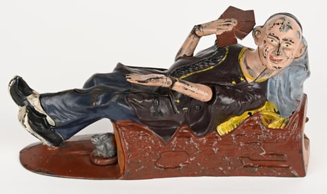 J&E STEVENS RECLINING CHINAMAN MECHANICAL BANK