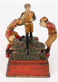 J&E STEVENS CALAMITY FOOTBALL MECHANICAL BANK