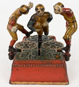 J&E STEVENS CALAMITY FOOTBALL MECHANICAL BANK