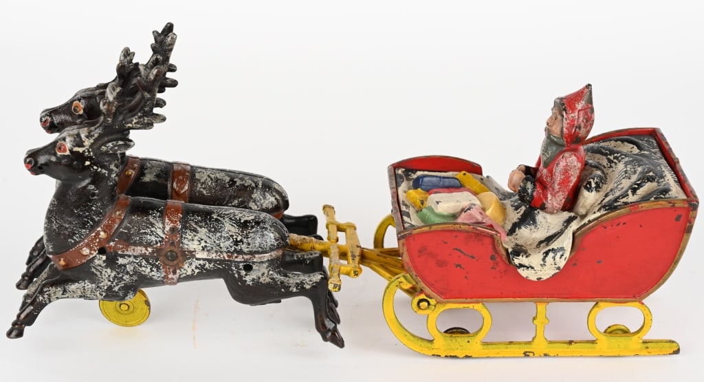 KYSER & REX SANTA CLAUS SLEIGH: Beautiful all Kyser & Rex Santa Sleigh with two reindeer. All original with no cracks or repairs. Wonderful example of a hard to fin toy. 13" Excellent-Near Mint