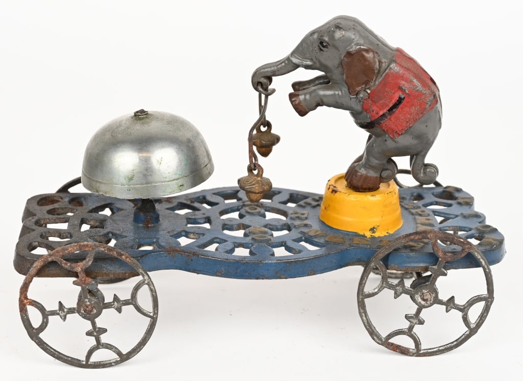 GONG BELL CAST IRON ELEPHANT BELL TOY: Cast iron Elephant bell toy. Strong overall original paint. There is an area of loss at front of toy. No cracks or repairs. 8" Excellent