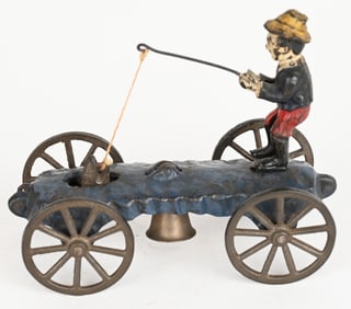 N.N. HILL CAST IRON BOY FISHING BELL TOY