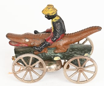 N. N. HILL CAST IRON BOY & ALLIGATOR BELL TOY