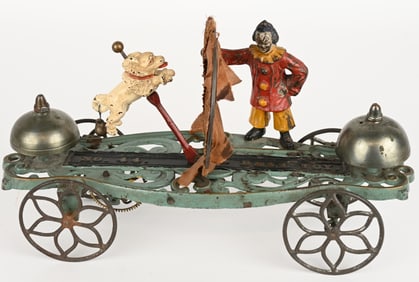GONG BELL CAST IRON CLOWN & POODLE BELL TOY