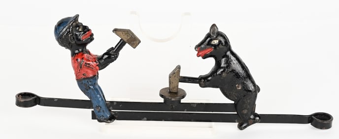 IVES CAST IRON MAN & BEAR CAP TOY