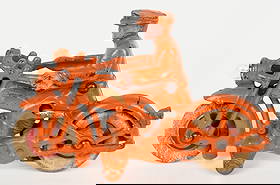 HUBLEY CAST IRON ELECTRIC LIGHT MOTORCYCLE ORANGE: Hubley electric light motorcycle. Light worked when tested. Complete and original with strong original paint. No cracks or repairs. 6 1/4" Excellent