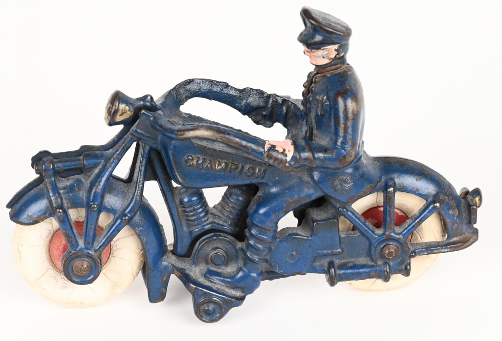 7" CHAMPION CAST IRON MOTORCYCLE: Champion Motorcycle. All original with no breaks or repairs. Has nice paint. 7" Excellent