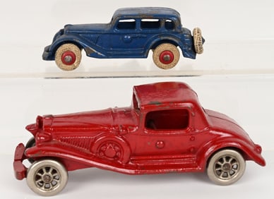 2- CHAMPION CAST IRON AUTOS