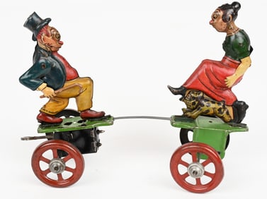 NIFTY TIN WINDUP MAGGIE & JIGGS PLATFORM TOY