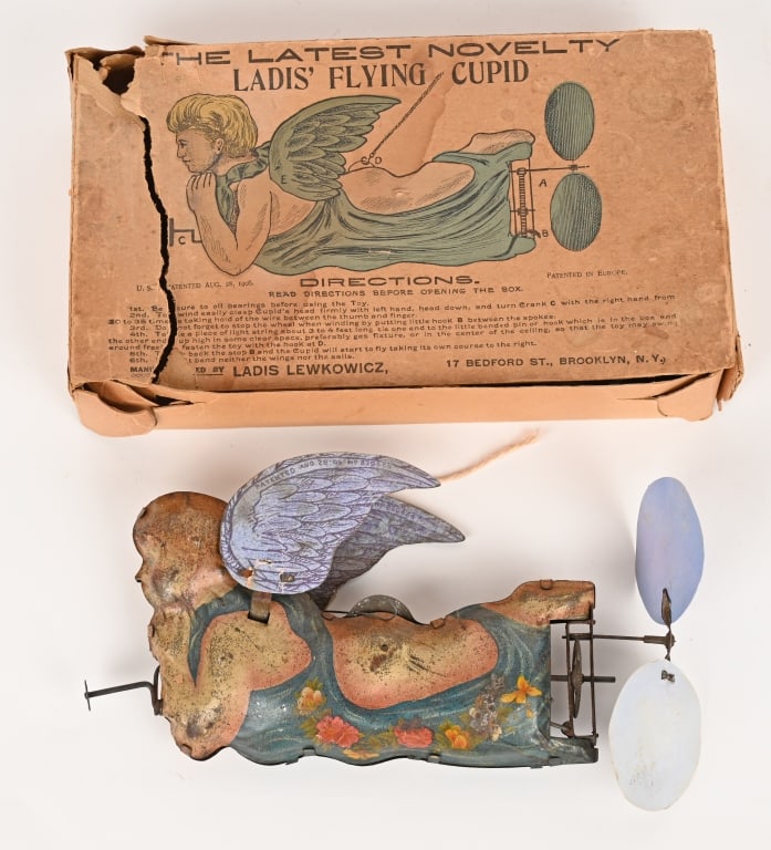 LADIS TIN WINDUP FLYING CUPID w/ BOX (1 of 8)