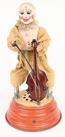 GERMAN CLOCKWORK CLOWN PLAYING CELLO