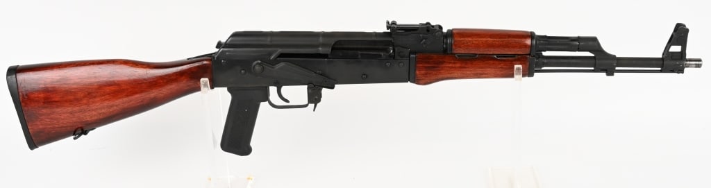 ROMANIAN ROMAK SEMI AUTO RIFLE IN 5.45X39MM: SERIAL NUMBER: 2-00366-99 BARREL: 16" CALIBER: 5.45 X 39MM MANUFACTURED: 1990's Import marked. Metal is parkerized finish with standard sights. Hardwood stock with oil finish and aftermarket butt plat