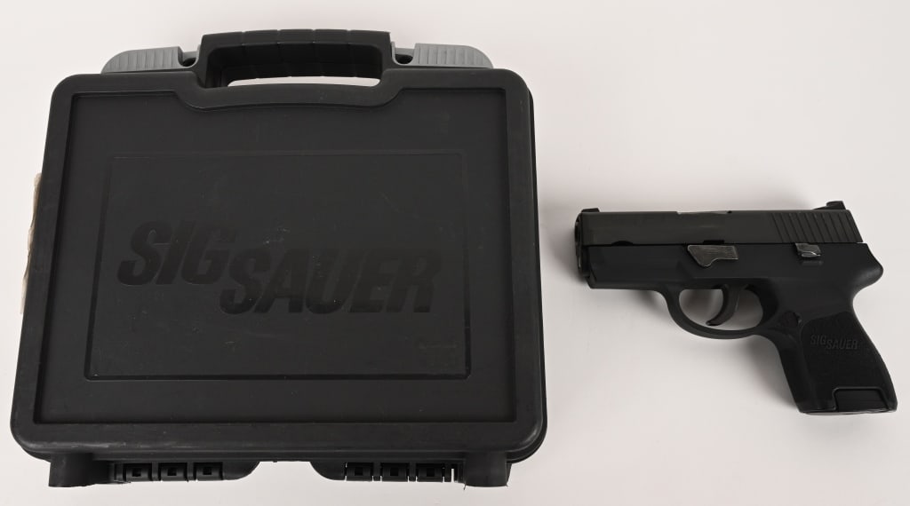 SIG SAUER P250 SEMI AUTO PISTOL WITH CASE: SERIAL NUMBER: EAK053711. BARREL: 3 1/2". CALIBER: .40 S&W. Double action only gun. Standard markings and features. Factory three dot sights, black nitride finished slide and black polymer frame. Incl