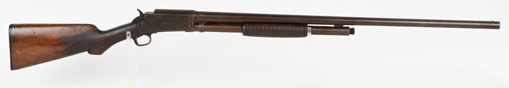 PRE WAR MARLIN MODEL 24 PUMP ACTION SHOTGUN 12 GA.: SERIAL NUMBER: 132456 BARREL: 32" CALIBER: 12 GA. 2 3/4" SHELLS MANUFACTURED: 1908 - 1917 Metal blue with patina and bead front sight. Stock and grooved forend are hard wood with hard rubber butt plat