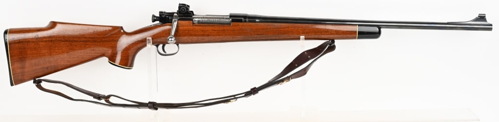 REMINGTON MODEL 1903-A3 SPORTER IN 30-06 SPRG.: SERIAL NUMBER: 4089702 BARREL: 21 1/2" CALIBER: 30-06 SPRG. MANUFACTURED: 1942 Blue finished steel with Ramped front sight and standard rear. Hardwood gloss finish stock with jeweled bolt. CONDITION: 