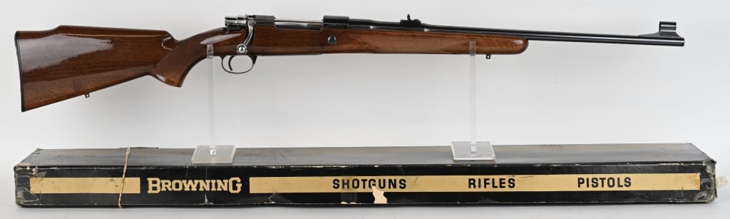 BROWNING BELGIUM SAFARI 30-06 MAUSER RIFLE W/BOX: SERIAL NUMBER: 65615L73. BARREL: 22". CALIBER: 30-06. MANUFACTURED: 1973. This bolt action rifle, made in Belgium by FN, utilizes a Mauser 98-type action. It features a deep blued finished barrel and