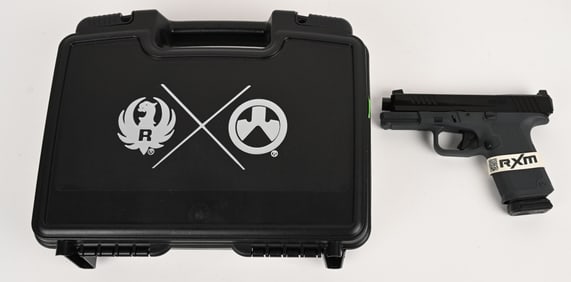 RUGER RXM SEMI AUTO PISTOL WITH FACTORY CASE