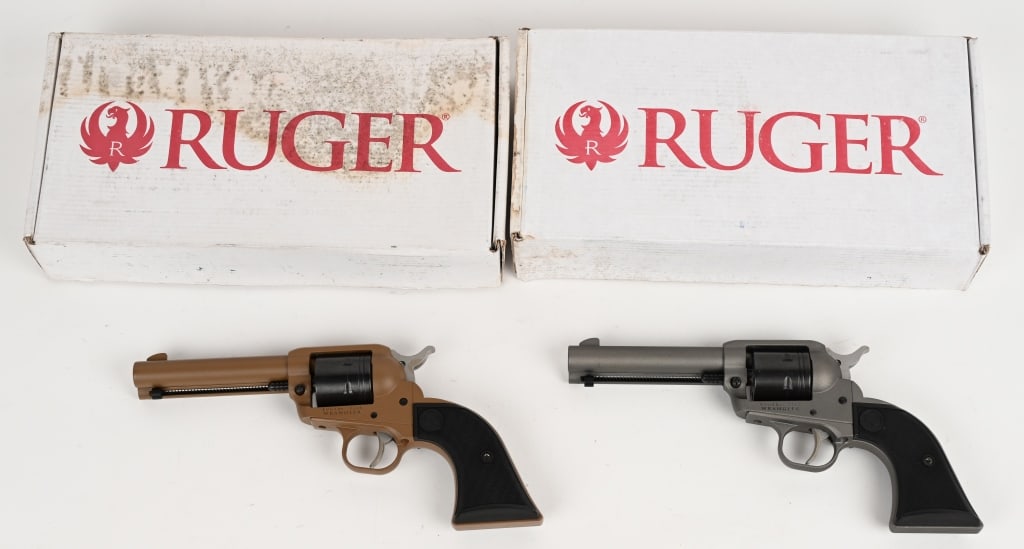 LOT OF 2 RUGER WRANGLER SINGEL ACTION REVOLVERS: SERIAL NUMBER: 204-57711. SERIAL NUMBER: 206-34572. BARREL: 4 1/2". CALIBER: .22 LR. These pistols feature a six shot, non-fluted cylinder, blade front sight and u-notch rear. Factory Cerakote finish 