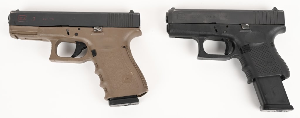 LOT OF TWIN GLOCK 40S SEMI AUTO PISTOLS: GLOCK 27 AUSTRIA SEMI AUTOMATIC PISTOL SERIAL NUMBER: VTL820. BARREL: 3 ?". CALIBER: .40 S&W. Glock Model 27 Gen-4 .40 S&W semi-automatic pistol. Black finish. Polymer frame with textured grips. Fixed