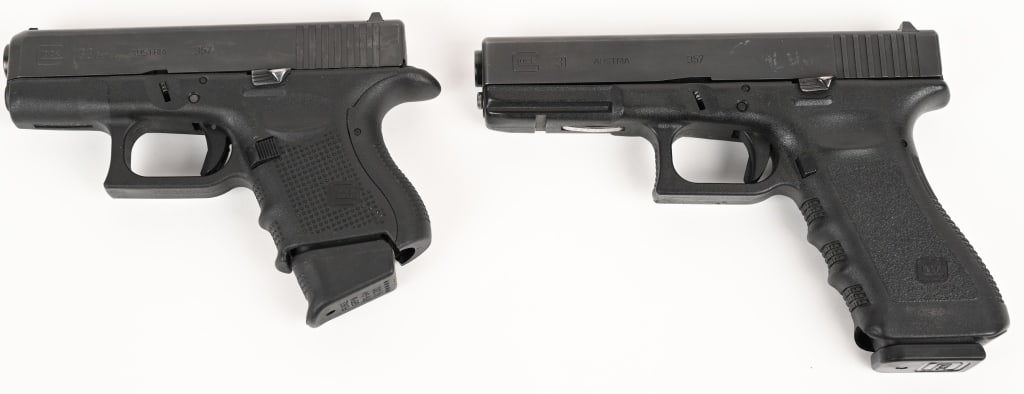 LOT OF TWIN GLOCK 357S SEMI AUTO PISTOLS: GLOCK 33 AUSTRIA GEN 4 SEMI AUTOMATIC PISTOL SERIAL NUMBER: BEAY181. BARREL: 3 3/8". CALIBER: .357 SIG. Black finish. Polymer frame with textured grips. Fixed front sight and u-notch rear sight. One 9