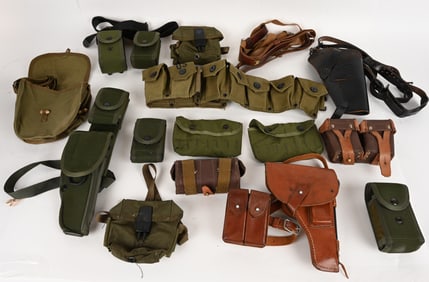 LOT OF MIXED MILITARY HOLSTERS AND POUCHES.