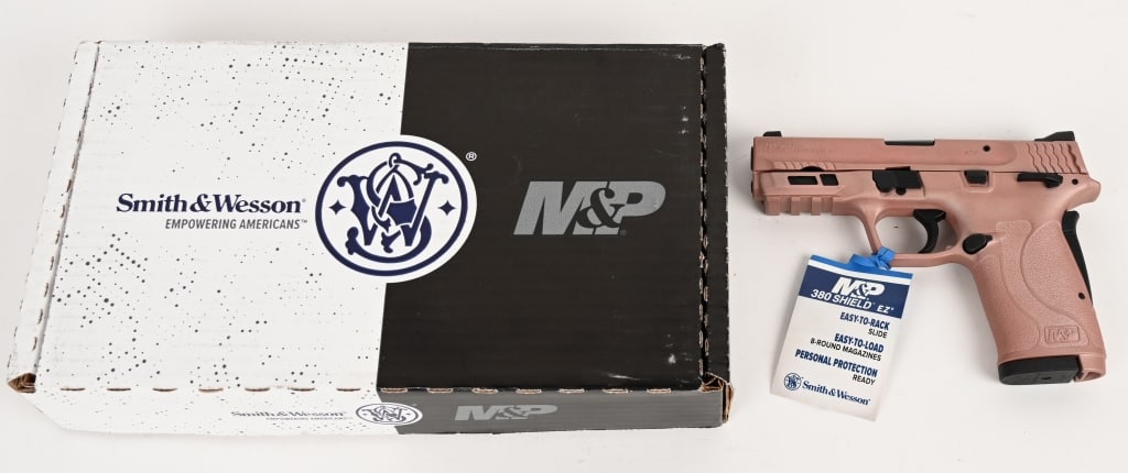 SMITH & WESSON M&P SHIELD ROSE GOLD: SERIAL NUMBER: FJT7149. BARREL: 3 5/8". CALIBER: .380 AUTO. This 380 Auto M2.0 sports a stylist Rose Gold Cerakote finish. It also features an ambidextrous safety, flat slide release and (2) 8 round m