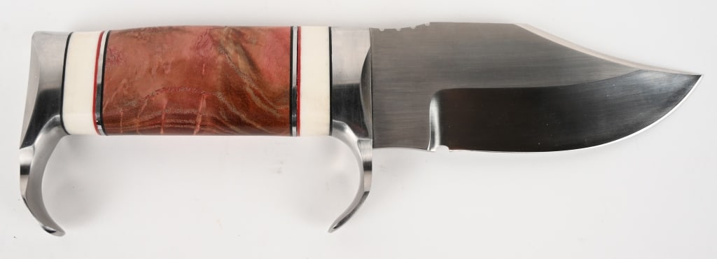 DAVE RICKE CUSTOM BLADE: Dave Ricke has been a voting member of the Knifemakers' Guild since 1983, and sold his first knife in 1978. Founding Member of the Badger Knife Club, 1999 Judges Award - Bowie, 1993 Best Bowie, 1983 B